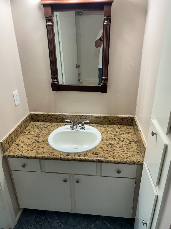 20333 Fieldtree Drive Humble, TX 77338 - Photo 16 of 23 a bathroom with a granite countertop sink and a mirror