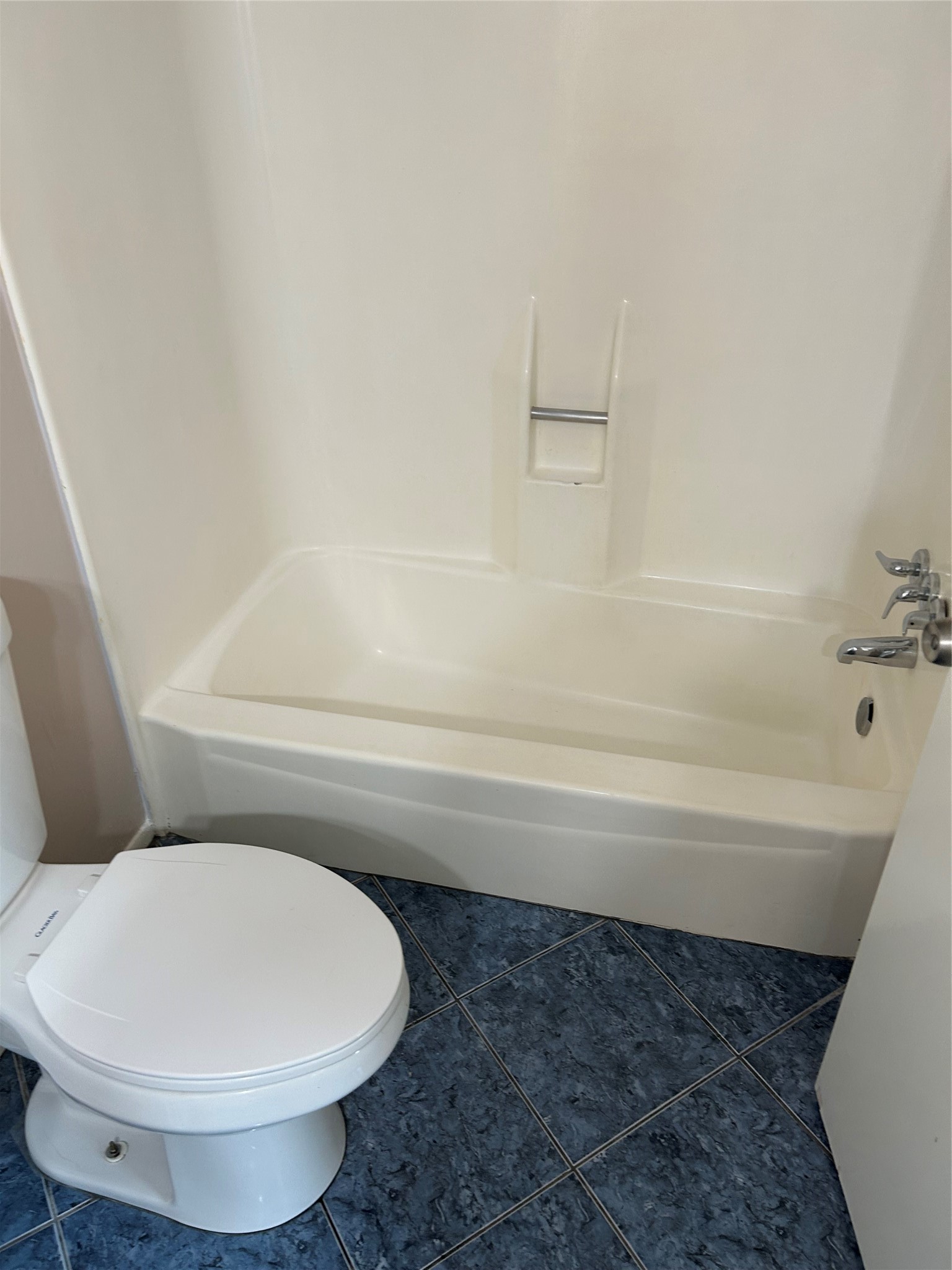 20333 Fieldtree Drive Humble, TX 77338 - Photo 21 of 23 a bathroom with a toilet and a bathtub