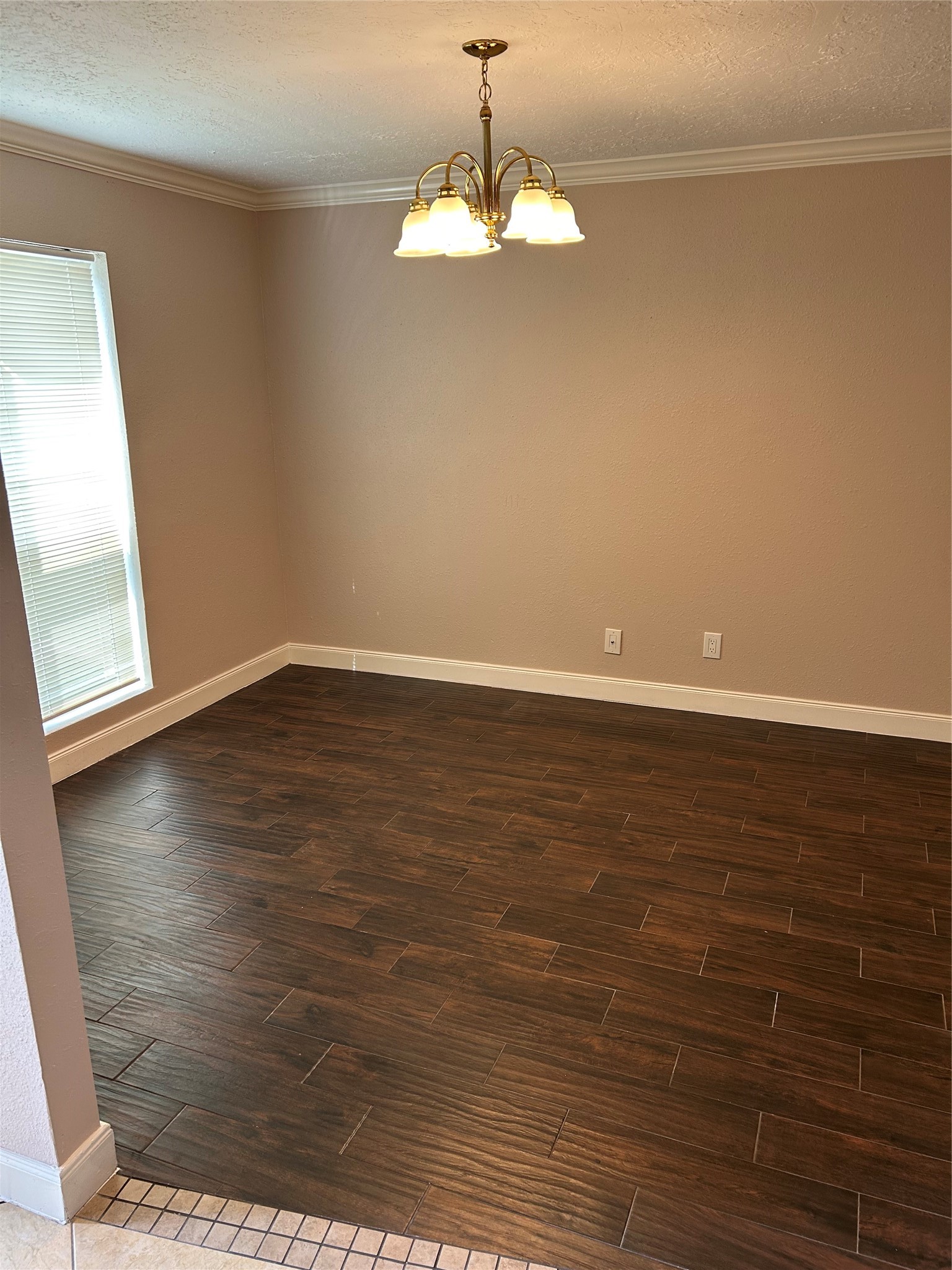 20333 Fieldtree Drive Humble, TX 77338 - Photo 7 of 23 a view of a room with wooden floor and a window