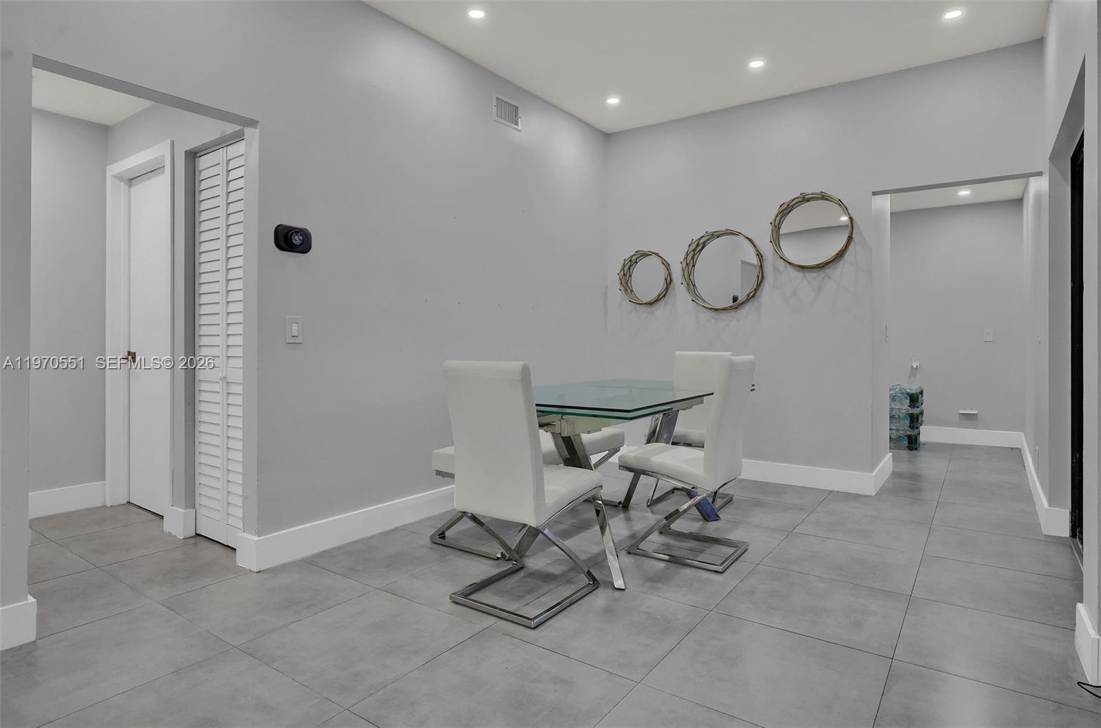 17032 Northwest 63rd Place Hialeah, FL 33015 - Photo 3 of 13 a view of a livingroom with furniture and a window
