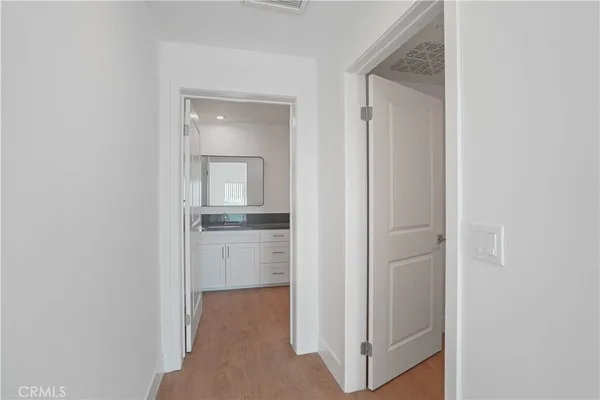 a en suite bathroom with a sink and a mirror