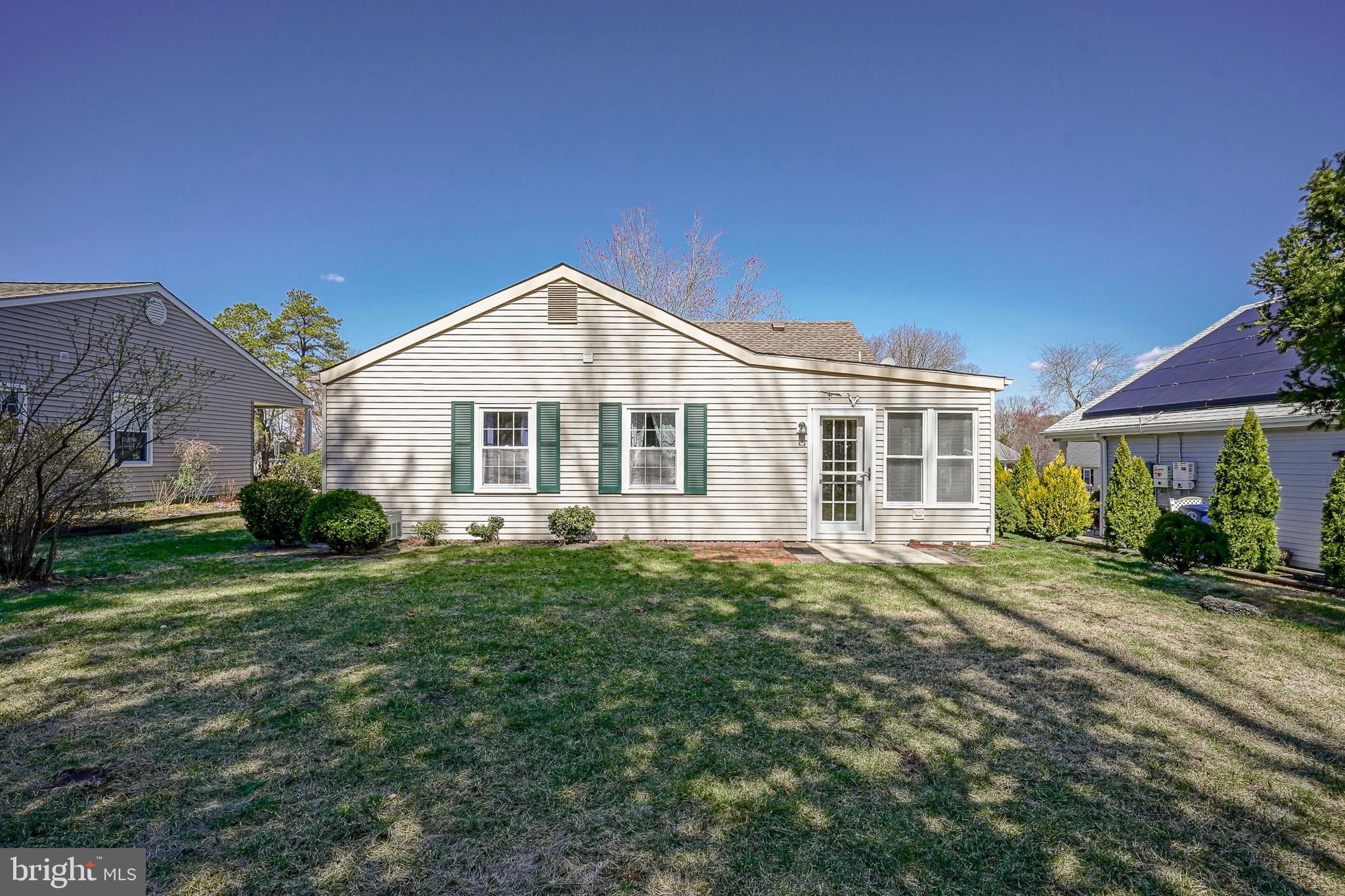 30 Buckingham Drive Southampton, NJ 08088 - Photo 22 of 24 a front view of a house with a garden