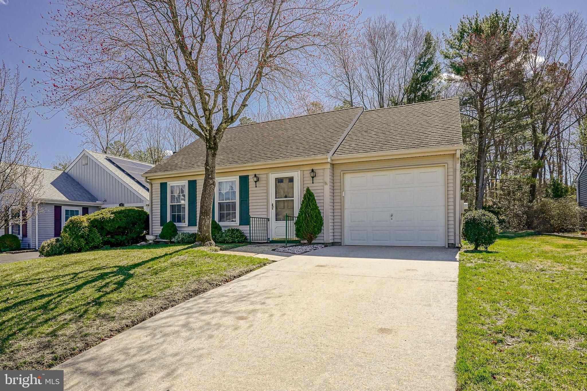 30 Buckingham Drive Southampton, NJ 08088 - Photo 23 of 24 a front view of a house with a yard and garage
