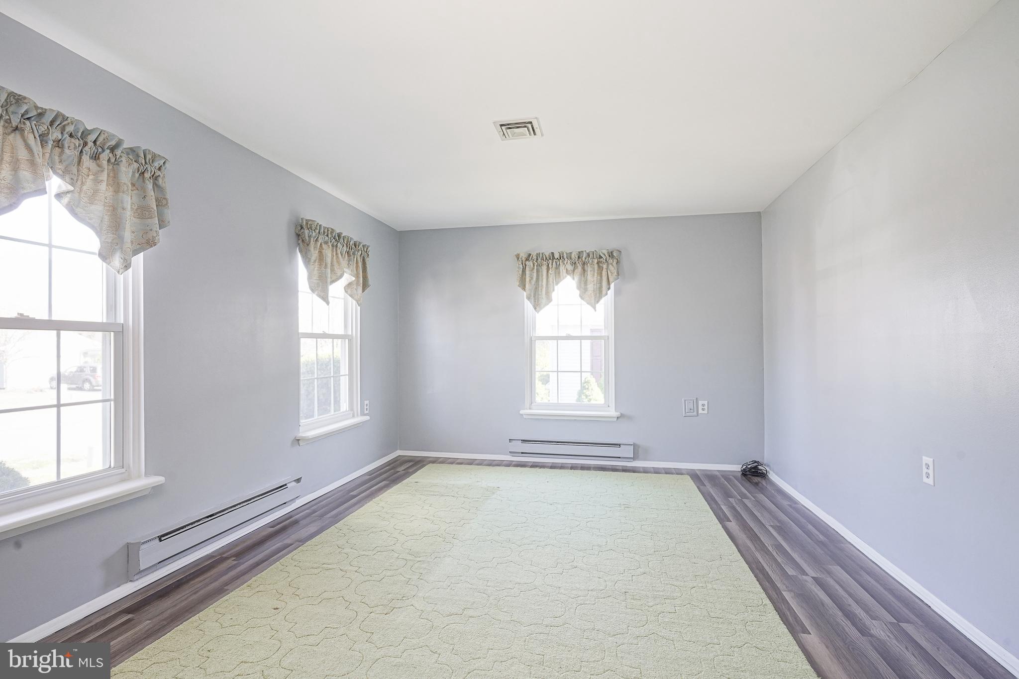 30 Buckingham Drive Southampton, NJ 08088 - Photo 4 of 24 a view of an empty room with a window