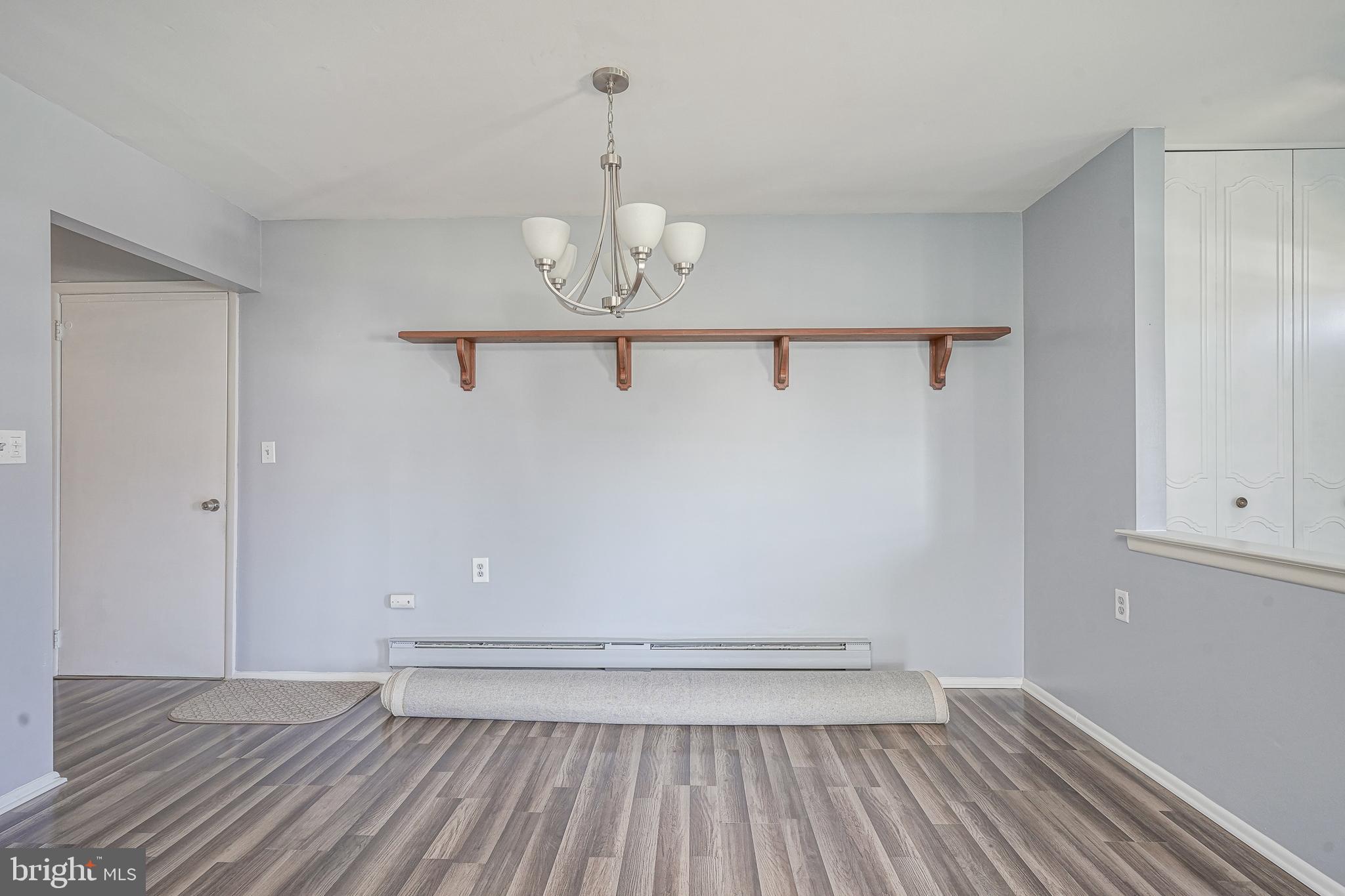 30 Buckingham Drive Southampton, NJ 08088 - Photo 7 of 24 a view of an empty room and wooden floor