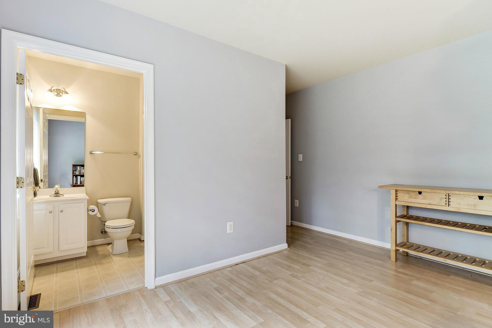 15530 Thompson Road Silver Spring, MD 20905 - Photo 14 of 30 a bathroom with a sink and a toilet