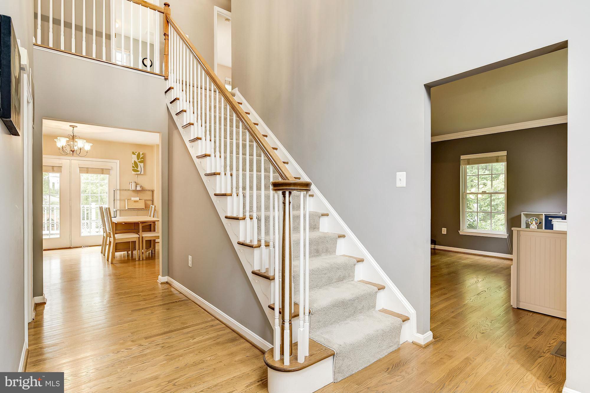15530 Thompson Road Silver Spring, MD 20905 - Photo 3 of 30 a view of entryway and hall with wooden floor