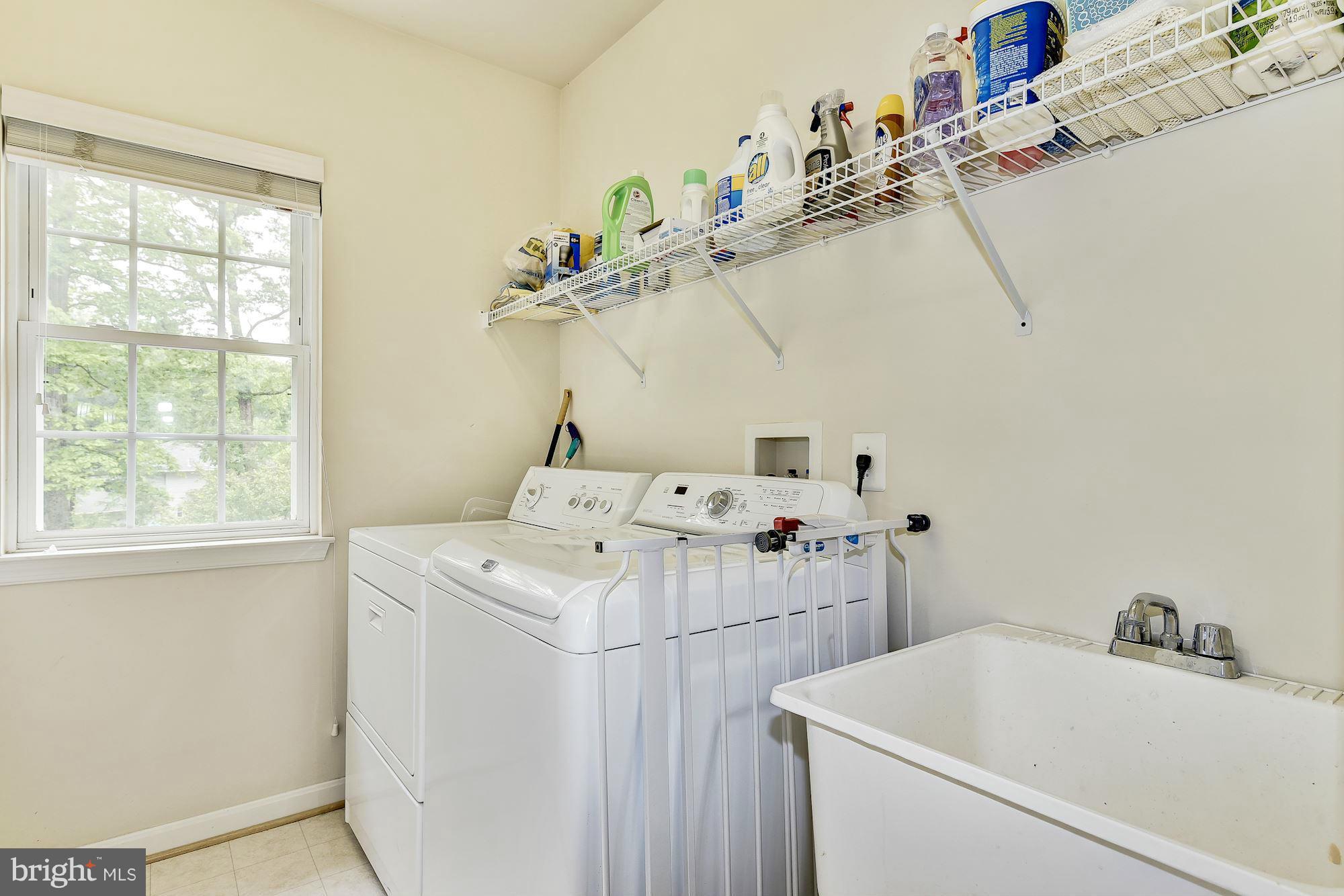 15530 Thompson Road Silver Spring, MD 20905 - Photo 24 of 30 a utility room with dryer and washer