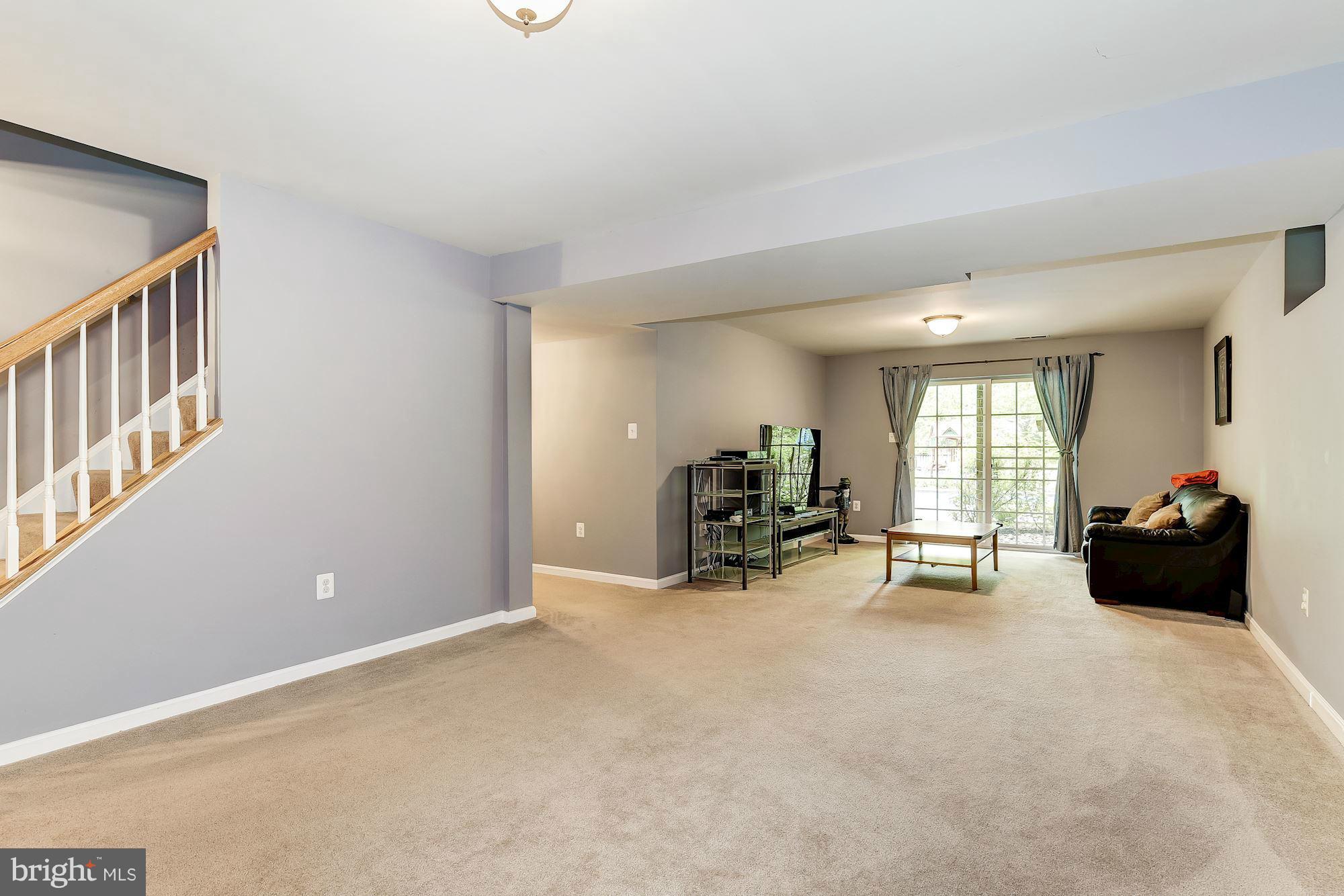 15530 Thompson Road Silver Spring, MD 20905 - Photo 27 of 30 a bed room with furniture and a window