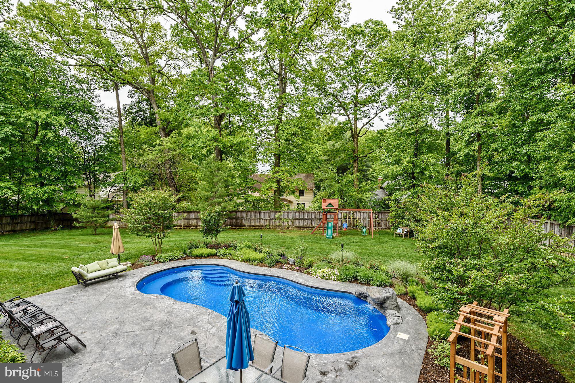 15530 Thompson Road Silver Spring, MD 20905 - Photo 30 of 30 a view of a backyard with swimming pool