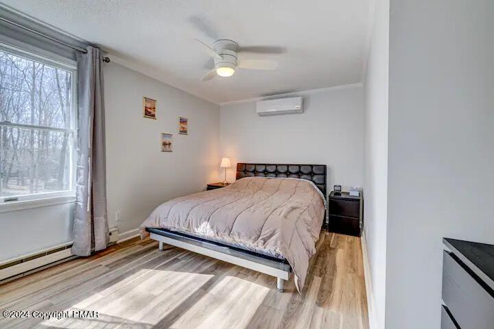 Sir Lionel Court Blakeslee, PA 18610 - Photo 12 of 23 a bedroom with a bed and a window