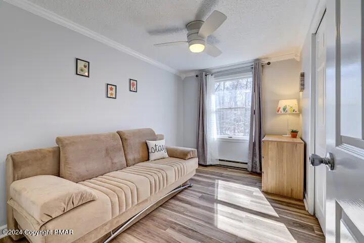 Sir Lionel Court Blakeslee, PA 18610 - Photo 13 of 23 a living room with a couch and a window