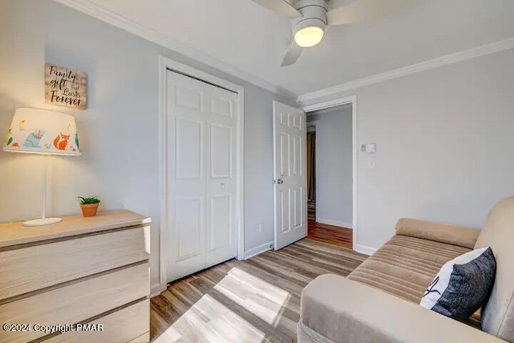 Sir Lionel Court Blakeslee, PA 18610 - Photo 14 of 23 a bedroom with a bed and a chandelier