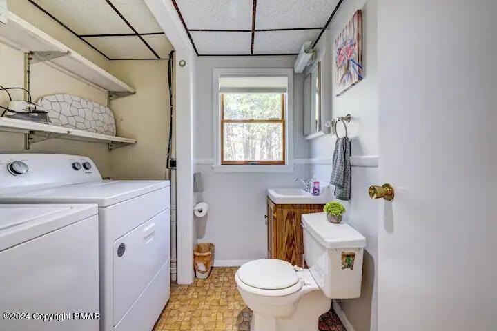 Sir Lionel Court Blakeslee, PA 18610 - Photo 18 of 23 a bathroom with a sink toilet and window