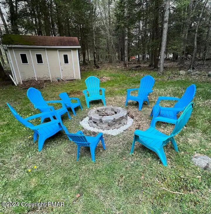 Sir Lionel Court Blakeslee, PA 18610 - Photo 19 of 23 a backyard of a house with table and chairs