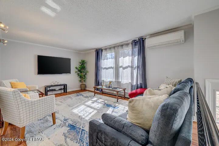 Sir Lionel Court Blakeslee, PA 18610 - Photo 2 of 23 a living room with furniture and a flat screen tv