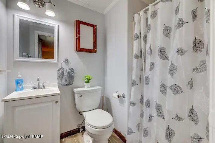 Sir Lionel Court Blakeslee, PA 18610 - Photo 10 of 23 a bathroom with a toilet sink and mirror