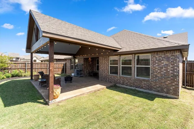 a view of a house with swimming pool and porch