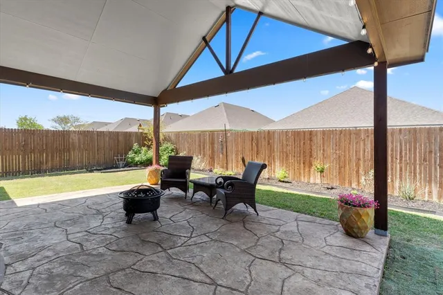a outdoor space with patio the couches and pool view