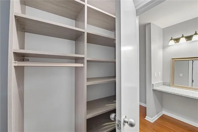 a view of an empty walk in closet