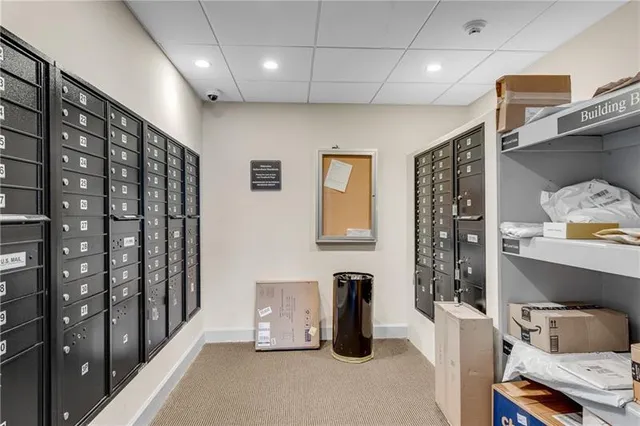 a view of an empty room and a window