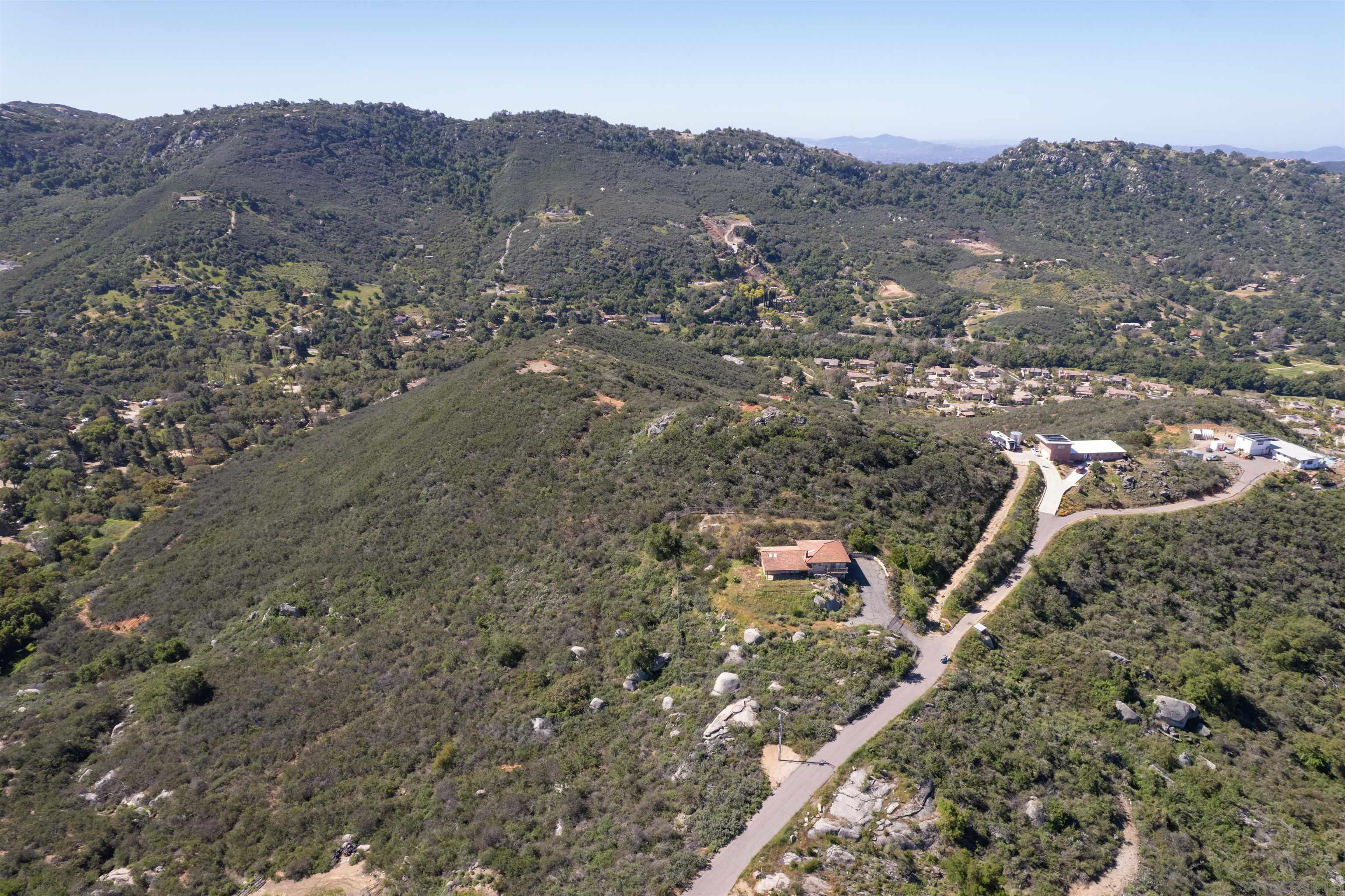 10 Cool Water Ranch Road Valley Center, CA 92082 - Photo 6 of 9 an aerial view of residential house and green space