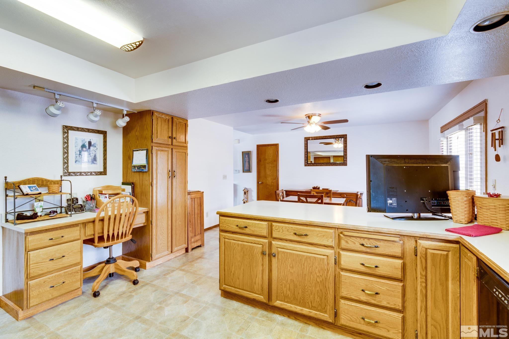 1850 Karin Drive Carson City, NV 89706 - Photo 12 of 40 a view of living room with flat screen tv