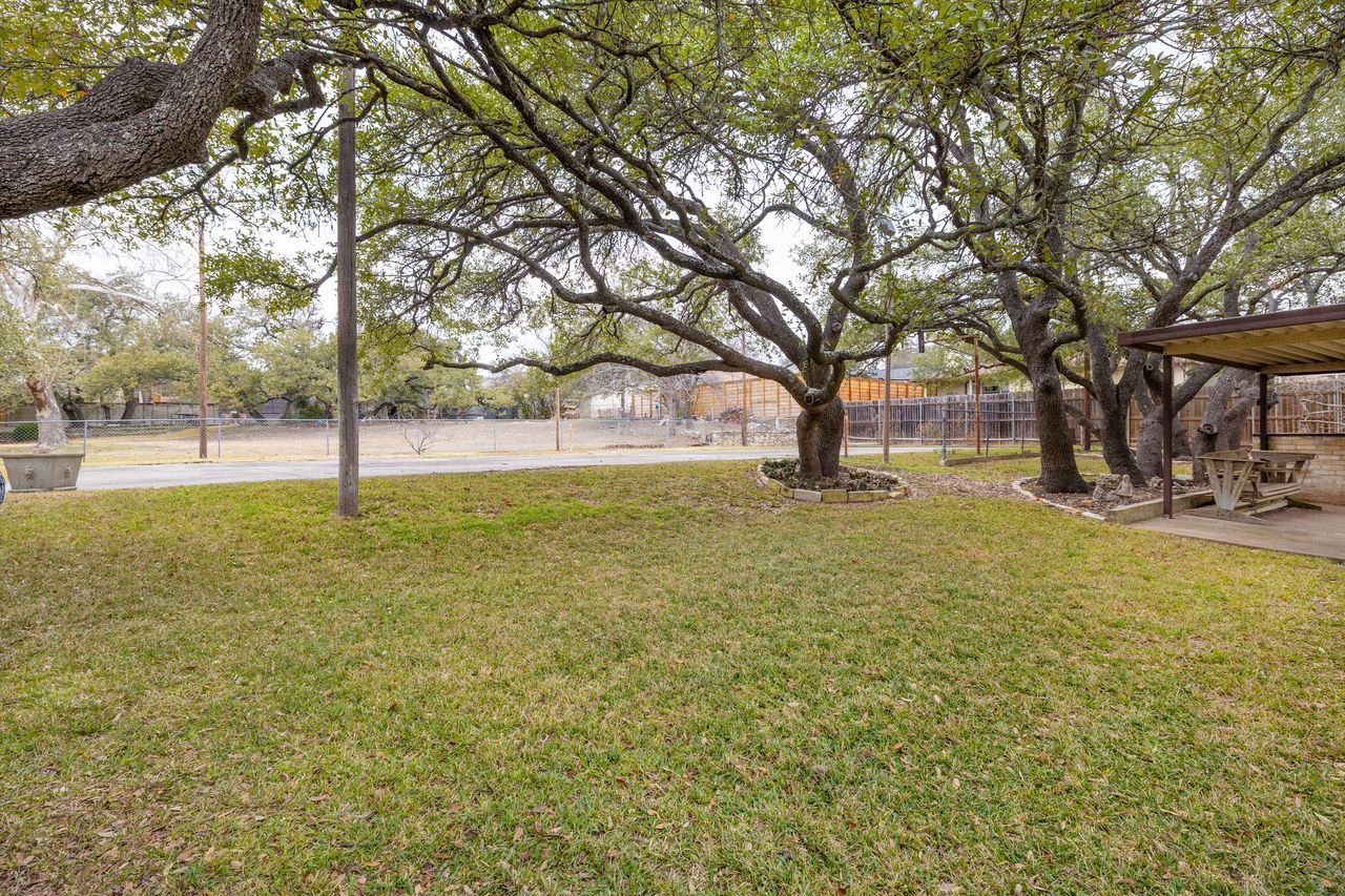 8606 Thunderbird Road, Unit A & B Austin, TX 78736 - Photo 9 of 33 View of yard and Tennis Court/ Pickle Ball