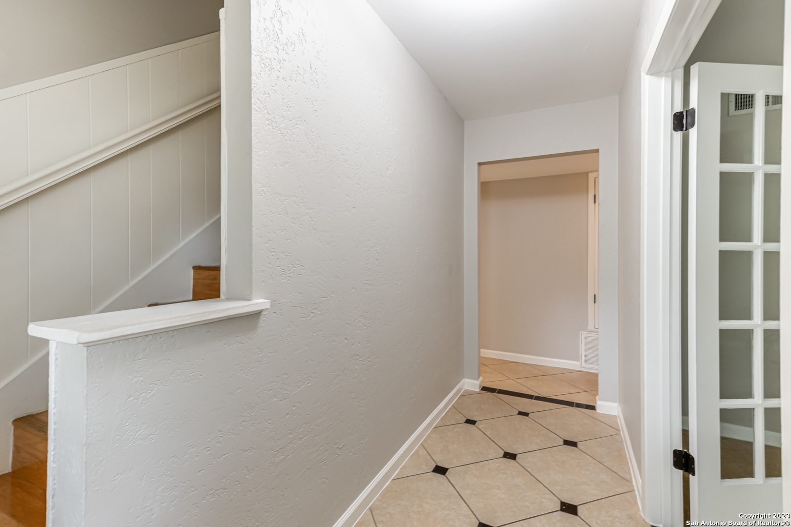 555 Patricia San Antonio, TX 78216 - Photo 5 of 33 a view of an entryway with wooden floor