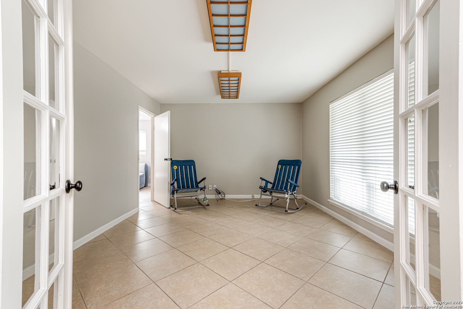 555 Patricia San Antonio, TX 78216 - Photo 6 of 33 a view of room with lounge chair and windows