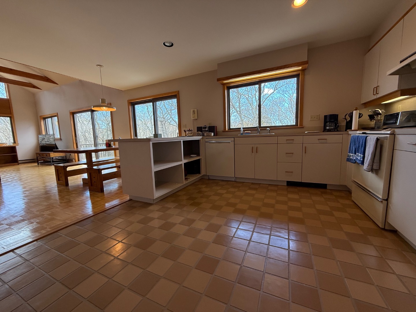 82 Oyster Pond Road Edgartown, MA 02539 - Photo 23 of 53 a kitchen with a sink and a stove top oven