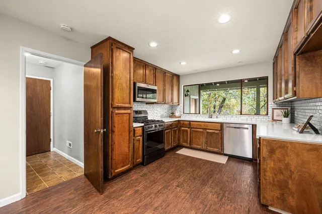a bathroom with a sink and a large mirror