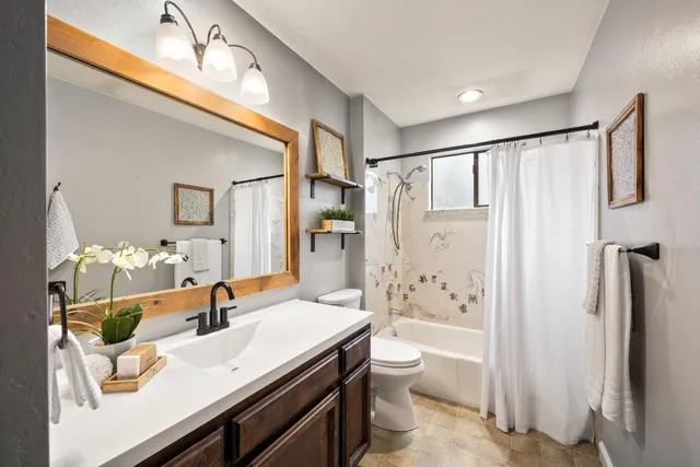 a view of outdoor space with deck and yard