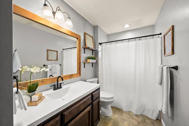 a view of deck with wooden floor and bench
