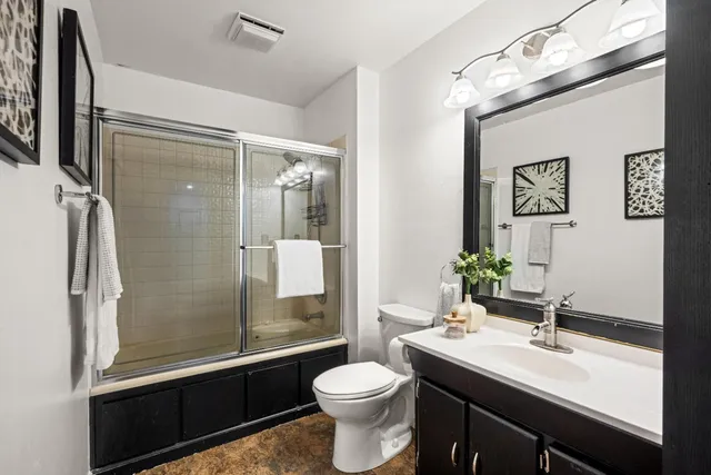 a view of a backyard with sitting area