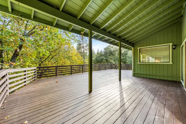 a backyard of a house with lots of green space