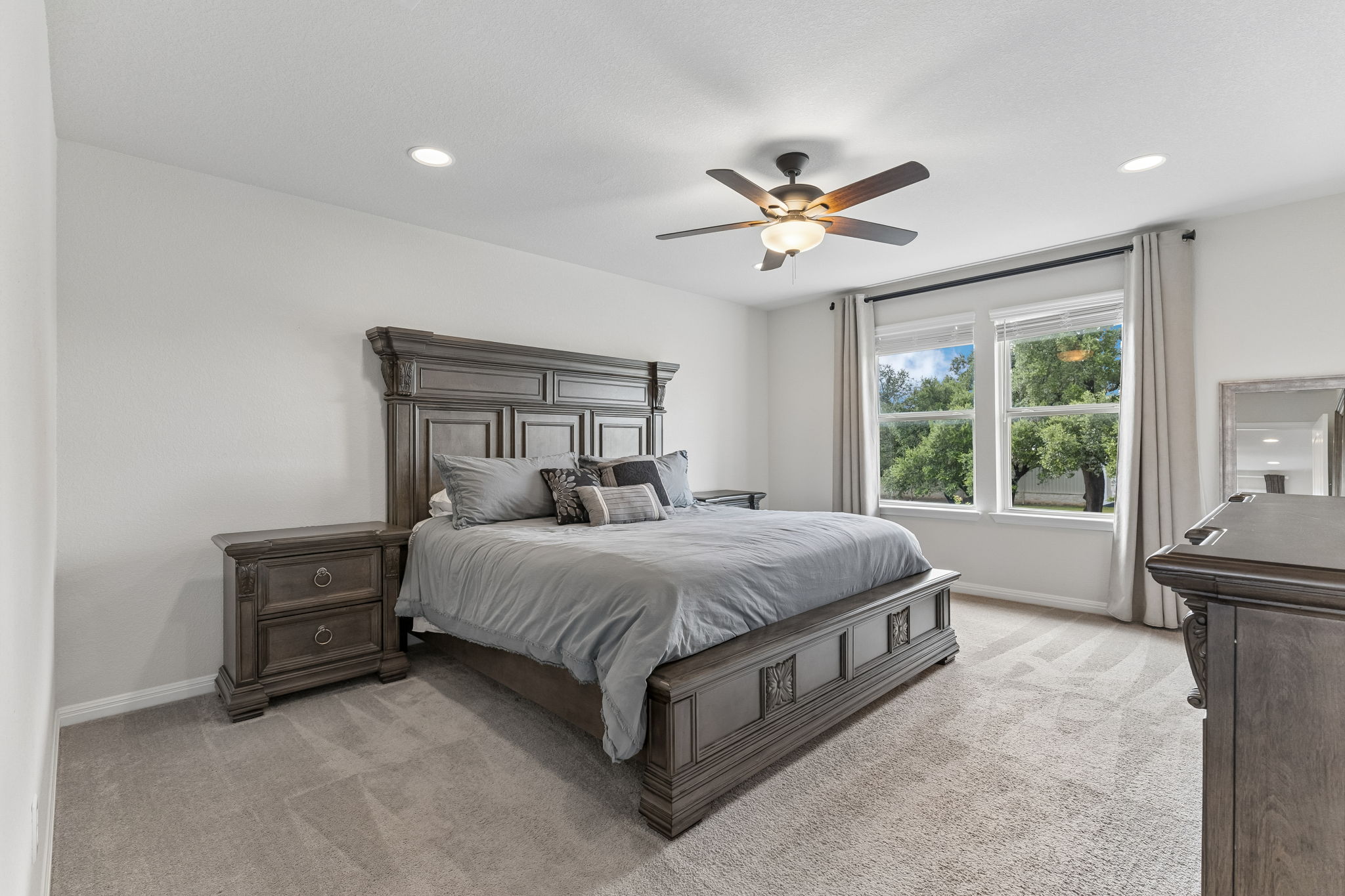 809 Whitman Avenue Georgetown, TX 78626 - Photo 21 of 35 a bedroom with a bed and a window
