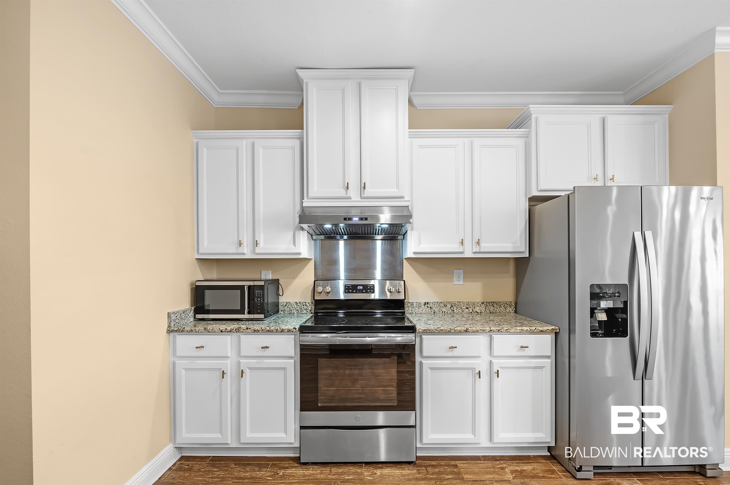 1211 Pembroke Way Foley, AL 36535 - Photo 7 of 32 Brand new outside vented range hood!