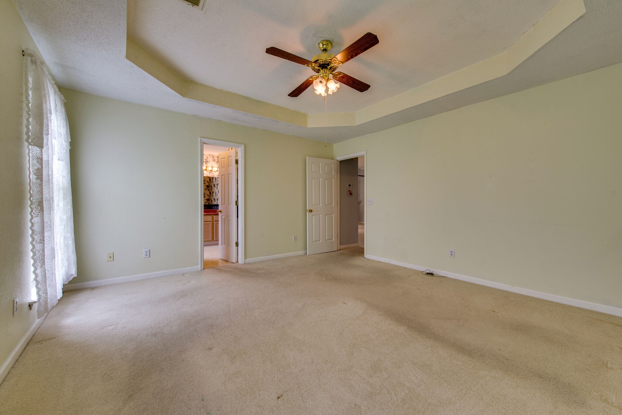 2123 Spring Hill Circle Spring Hill, TN 37174 - Photo 21 of 32 an empty room with ceiling fan and window