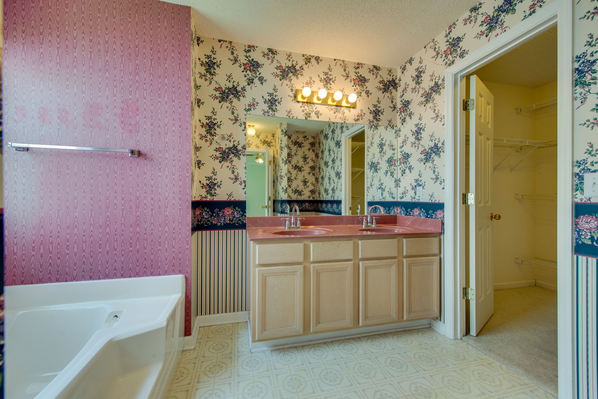 2123 Spring Hill Circle Spring Hill, TN 37174 - Photo 24 of 32 a bathroom with a sink and a mirror