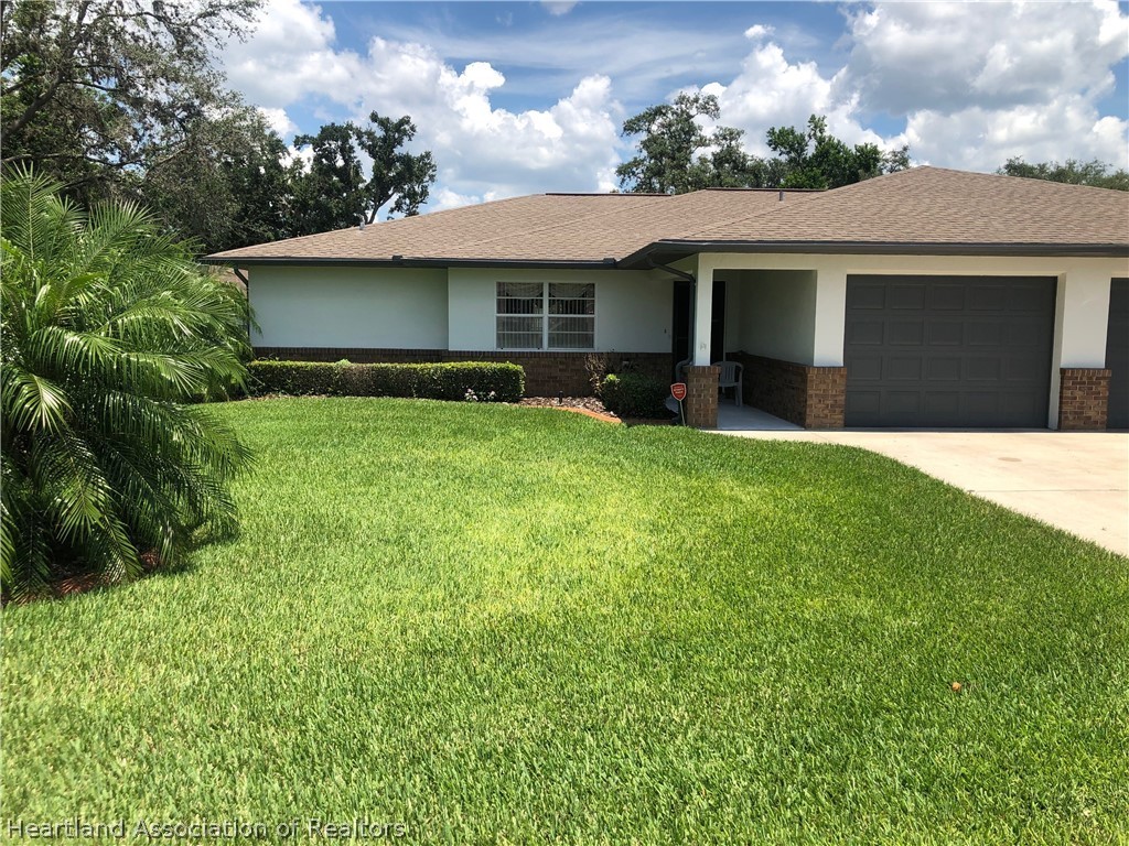 2510 Davis Circle Sebring, FL 33870 - Photo 1 of 23 a view of a house with a yard