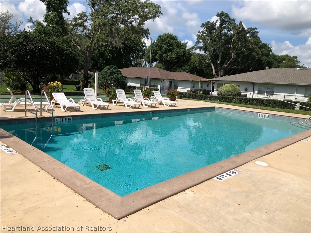 2510 Davis Circle Sebring, FL 33870 - Photo 22 of 23 a view of swimming pool with lounge chair