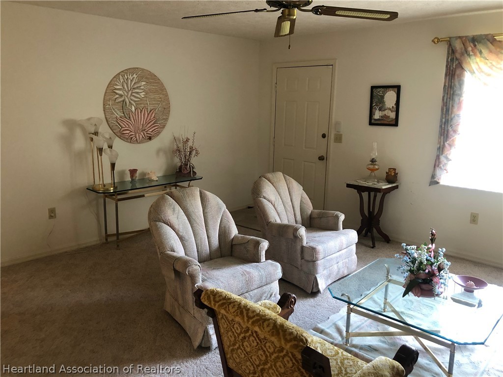 2510 Davis Circle Sebring, FL 33870 - Photo 3 of 23 a living room with furniture a window and a table