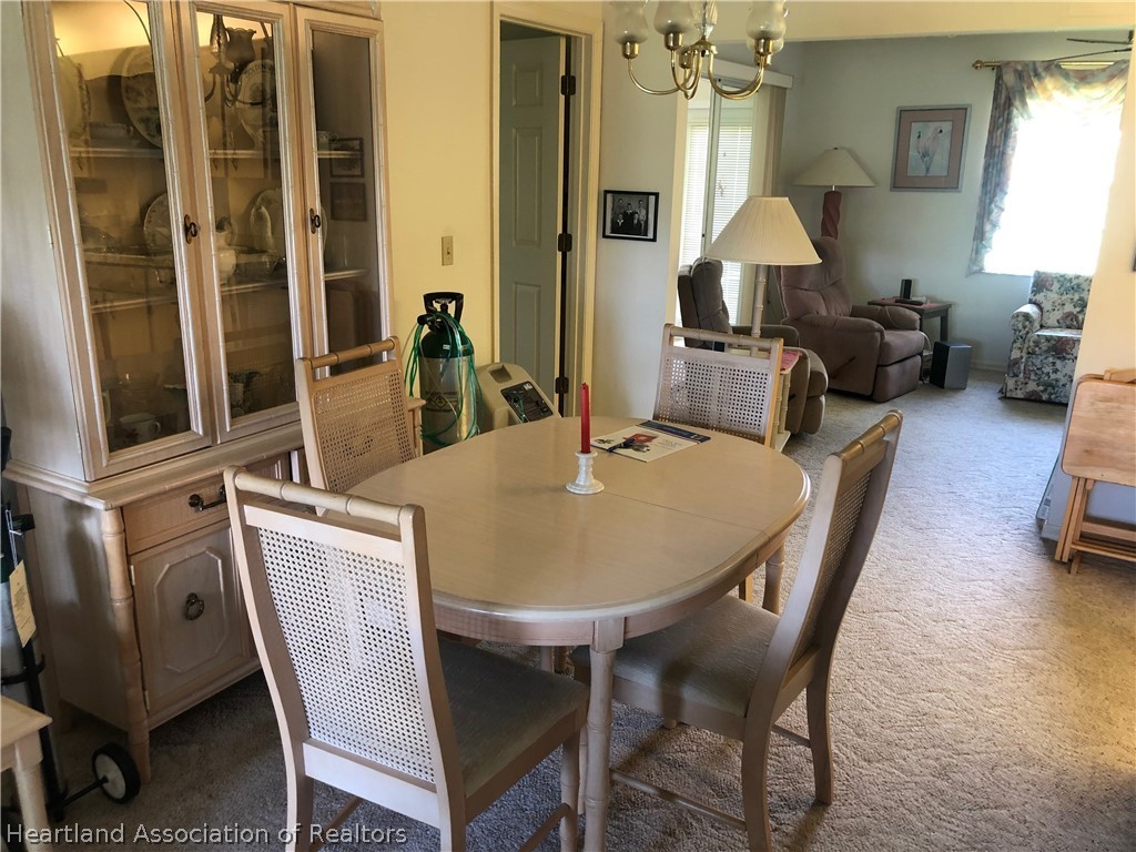 2510 Davis Circle Sebring, FL 33870 - Photo 6 of 23 a view of a dining room with furniture