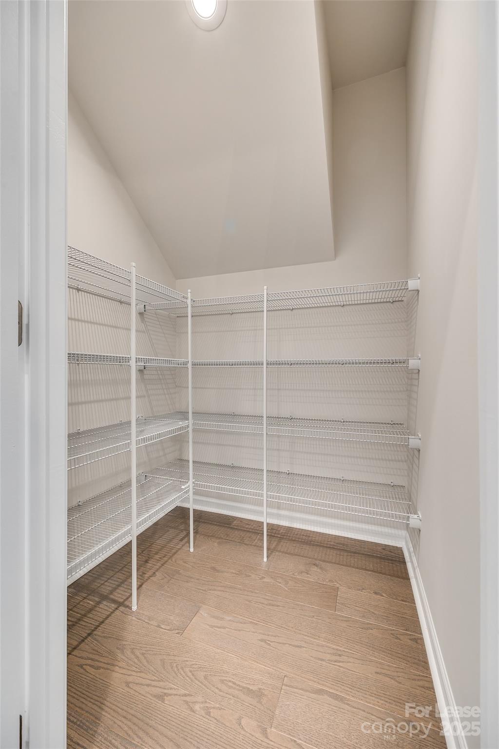 229 Brooks Springs Drive, Unit 34 Fort Mill, SC 29708 - Photo 11 of 31 a view of an empty room with empty racks