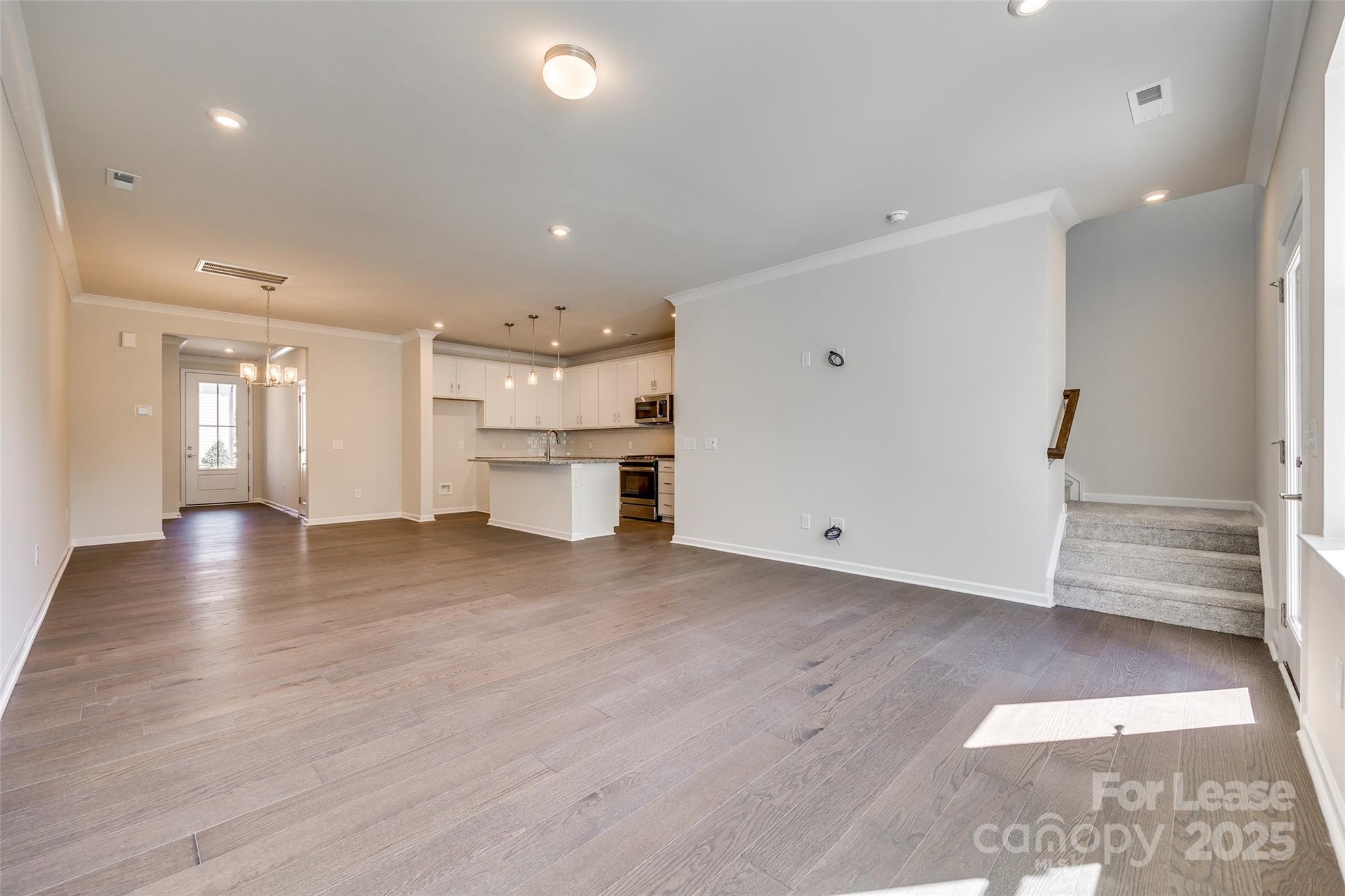 229 Brooks Springs Drive, Unit 34 Fort Mill, SC 29708 - Photo 14 of 31 a view of a kitchen with a sink and a refrigerator