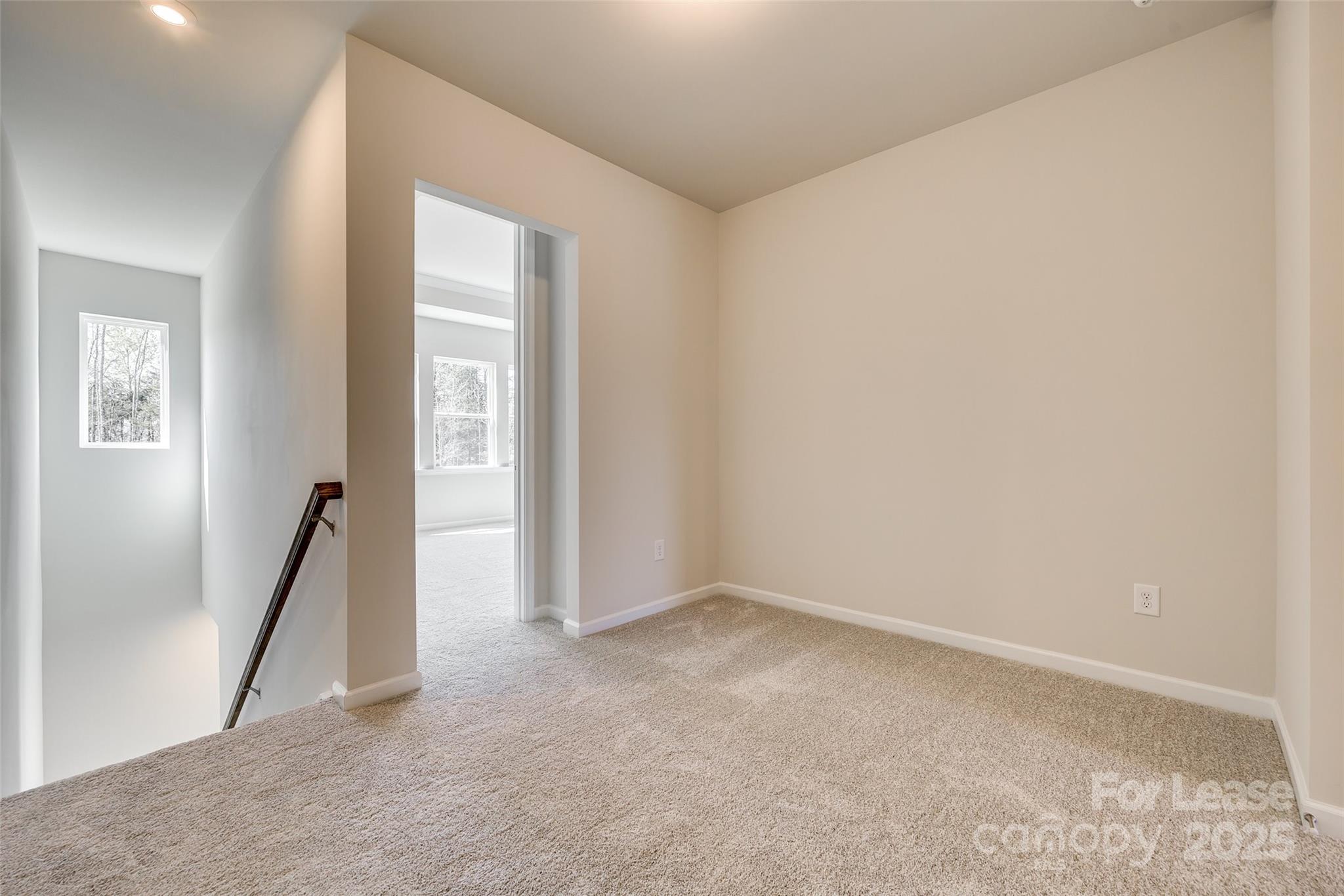 229 Brooks Springs Drive, Unit 34 Fort Mill, SC 29708 - Photo 16 of 31 an empty room with windows
