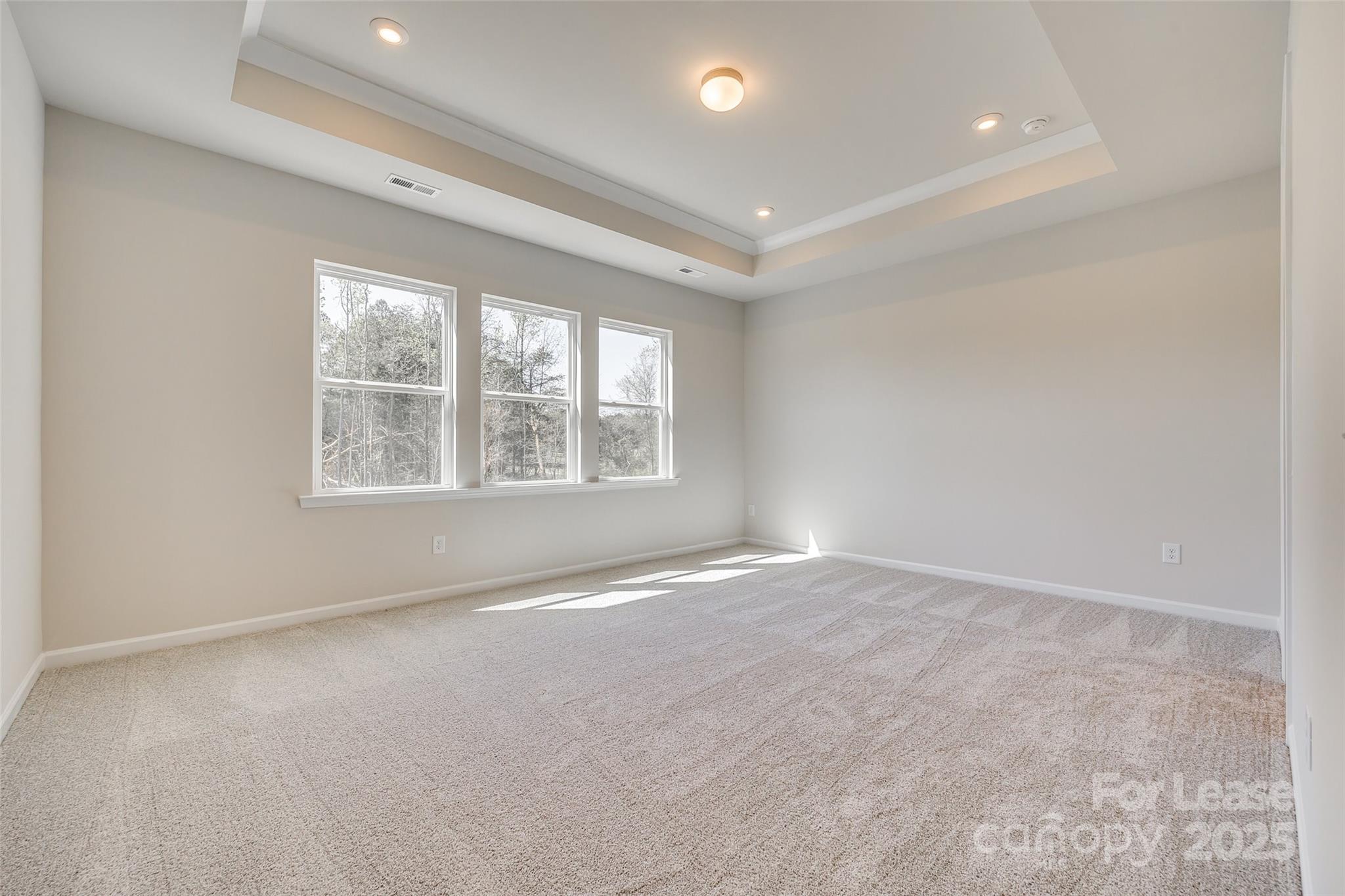 229 Brooks Springs Drive, Unit 34 Fort Mill, SC 29708 - Photo 17 of 31 an empty room with windows