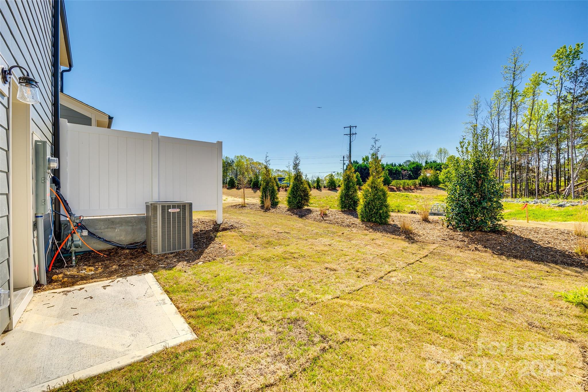 229 Brooks Springs Drive, Unit 34 Fort Mill, SC 29708 - Photo 29 of 31 a view of a backyard of the house