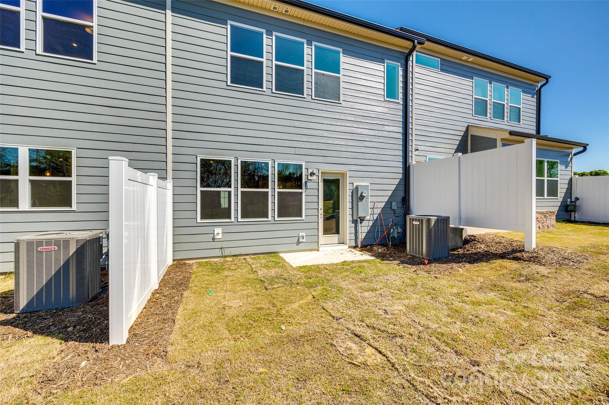 229 Brooks Springs Drive, Unit 34 Fort Mill, SC 29708 - Photo 30 of 31 a view of a house with a sink and refrigerator